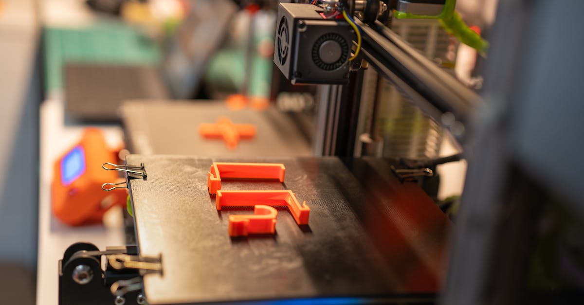 3D printed bridge production parts being quality inspected on a work table