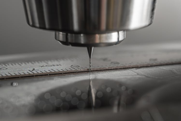 Close-up of a CNC milling machine working on metal
