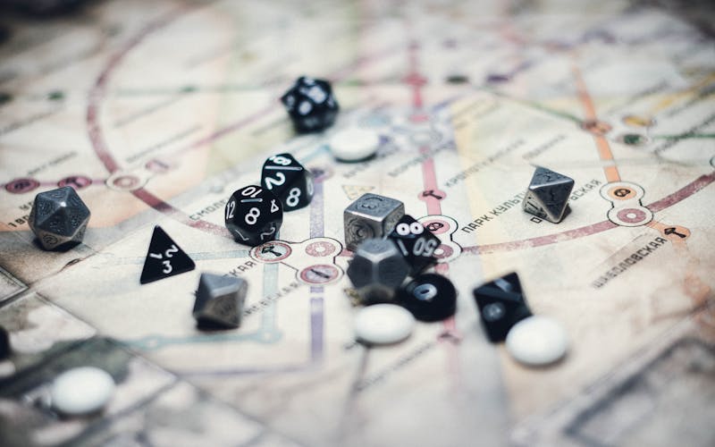 Polyhedral dice on a tabletop game board